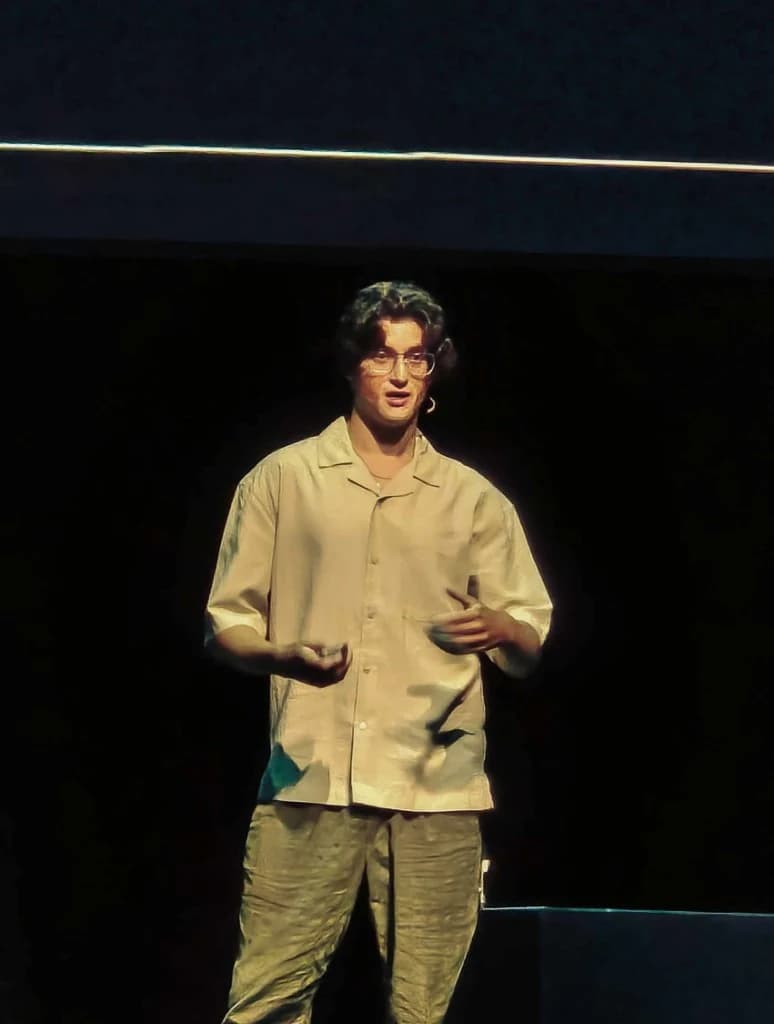 Founder presenting on stage
